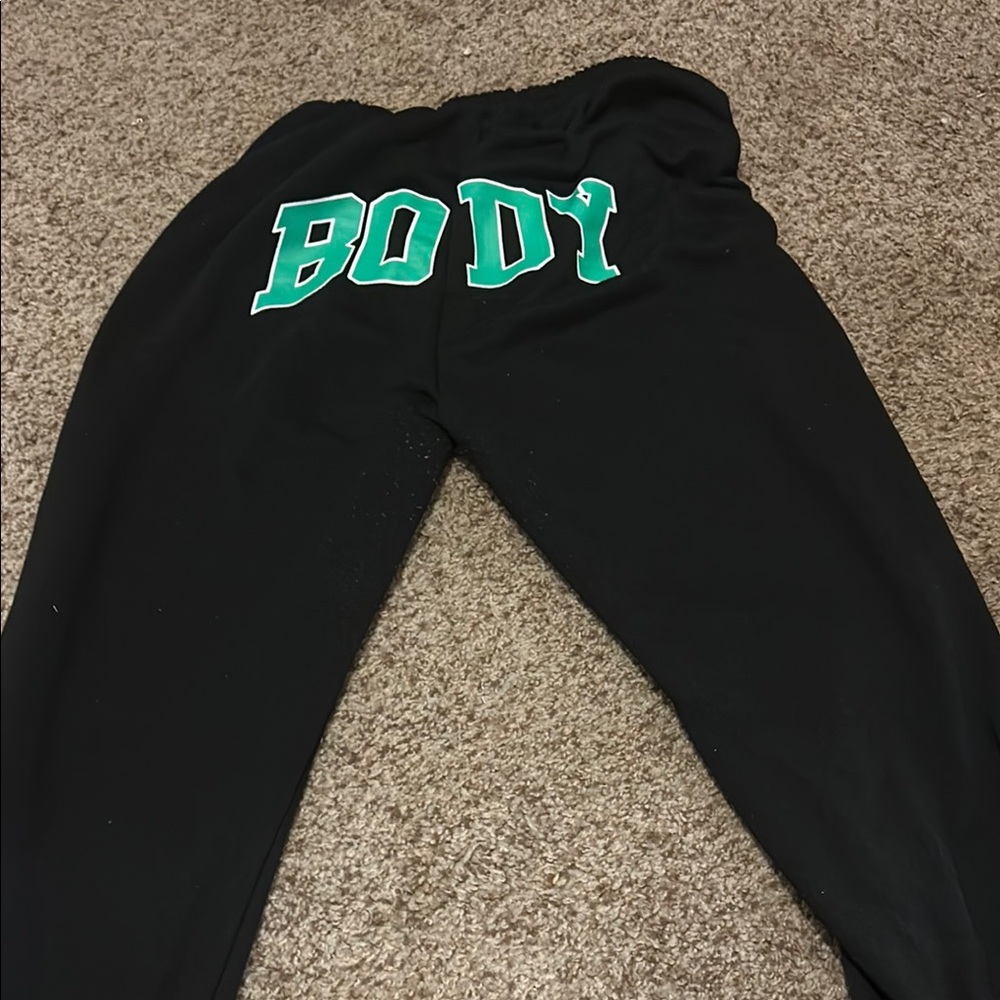 Black Sweatpants with Green Print